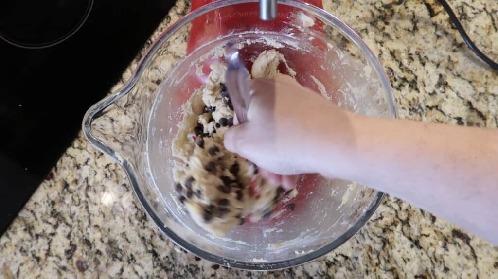 Folding chocolate chips into dough